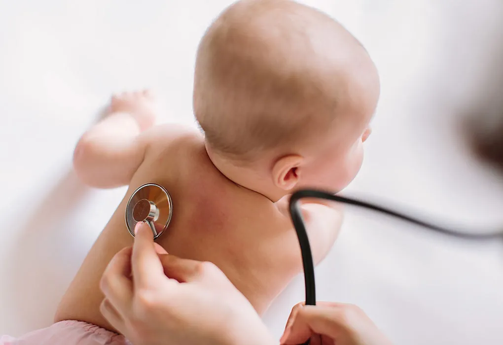 Doctor checking a baby
