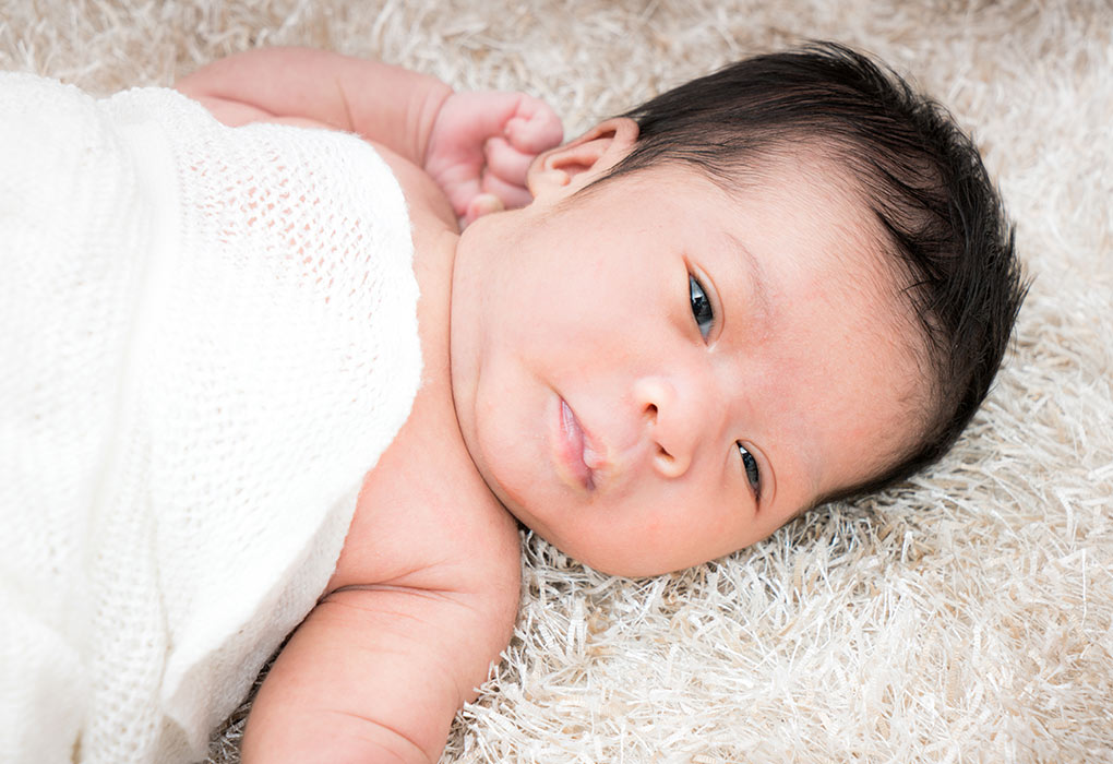 baby sleeps with eyes open