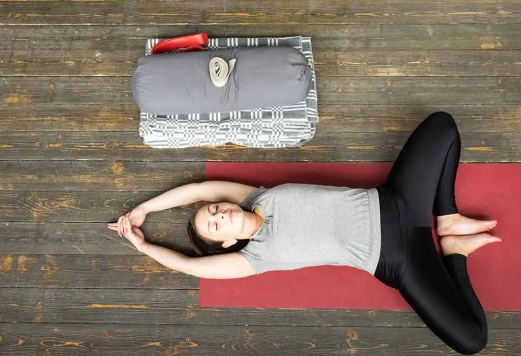Supta Badhakonasana, or Reclining Butterfly Pose