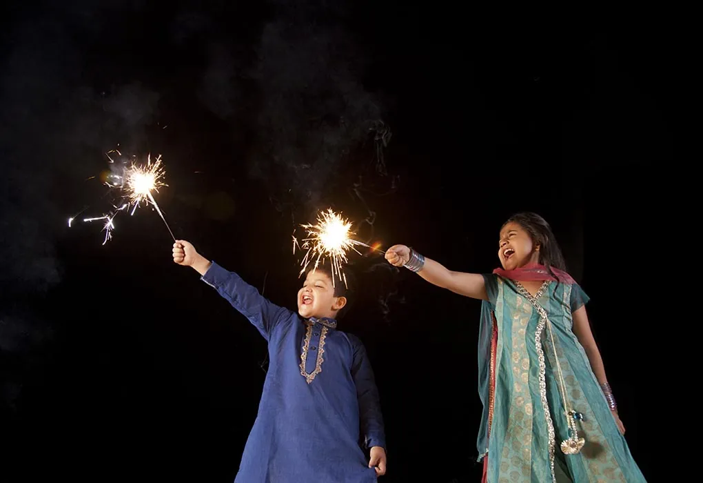 Child celebrating diwali