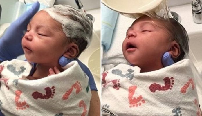 this newborn babys reaction to her first hair wash is the happiest thing youll see today