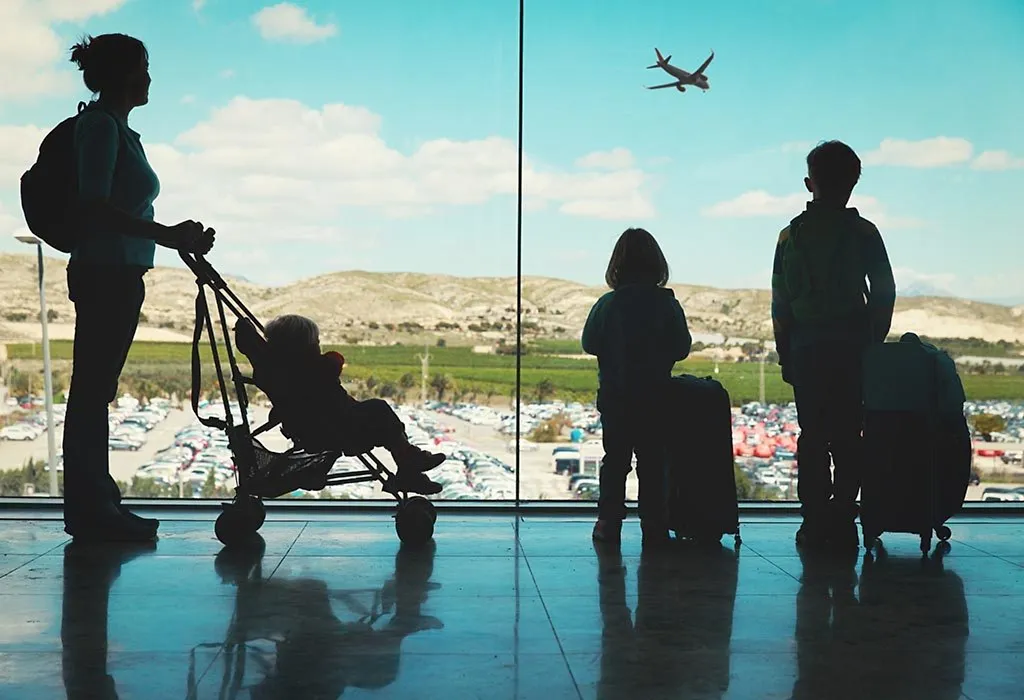 Single mom and children at airport