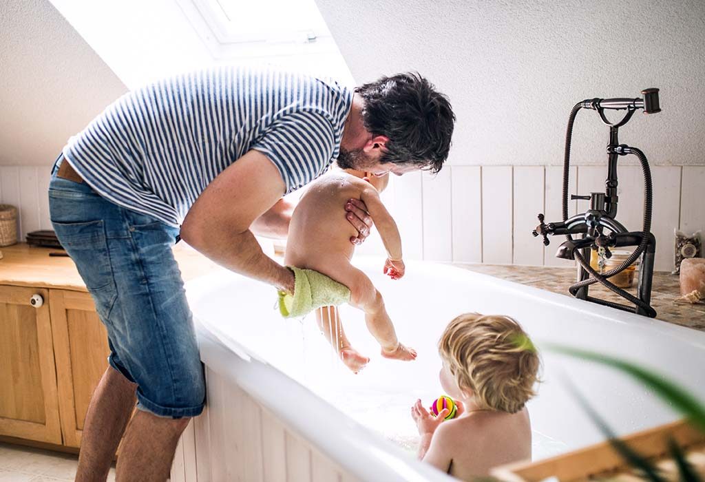 help your child out of the shower and drain out water after bath