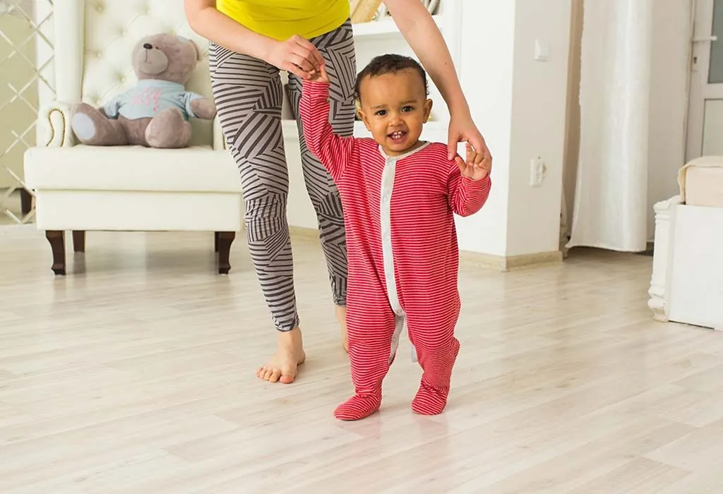 your baby will be able to walk with support at 9-12 months