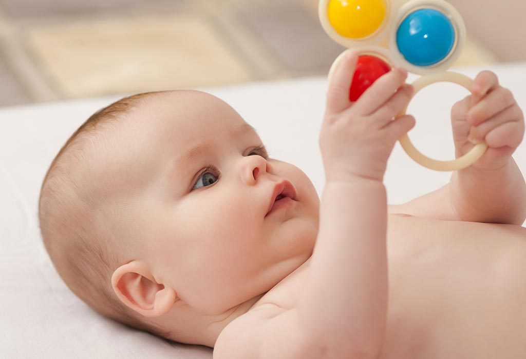 give your baby a shiny toy to distract him from the changing process
