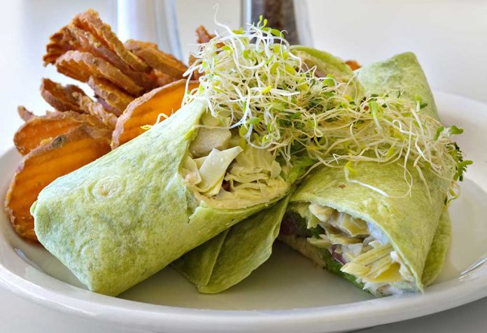 Greek veggie wrap with spinach tortilla Recipe