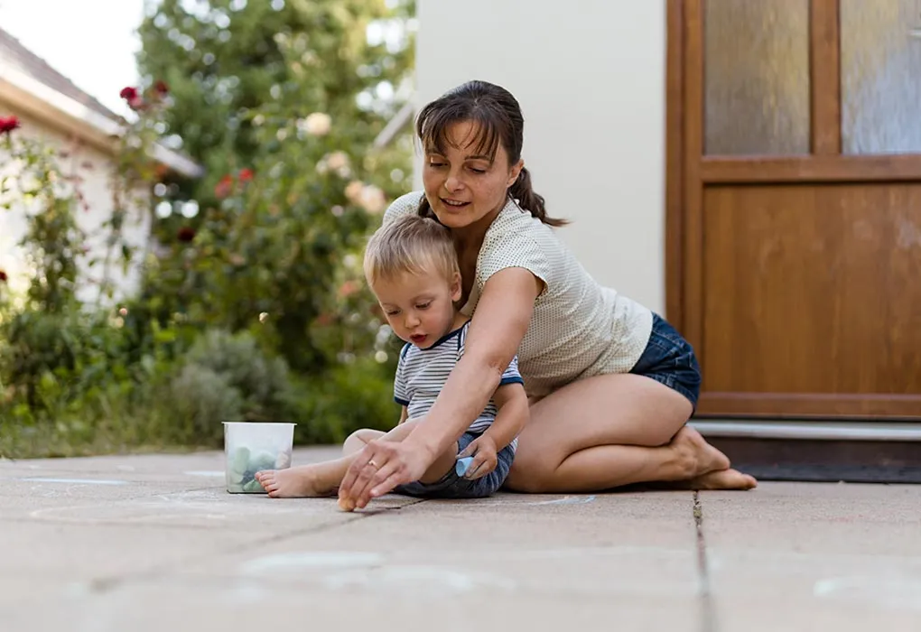 Mother and son playing