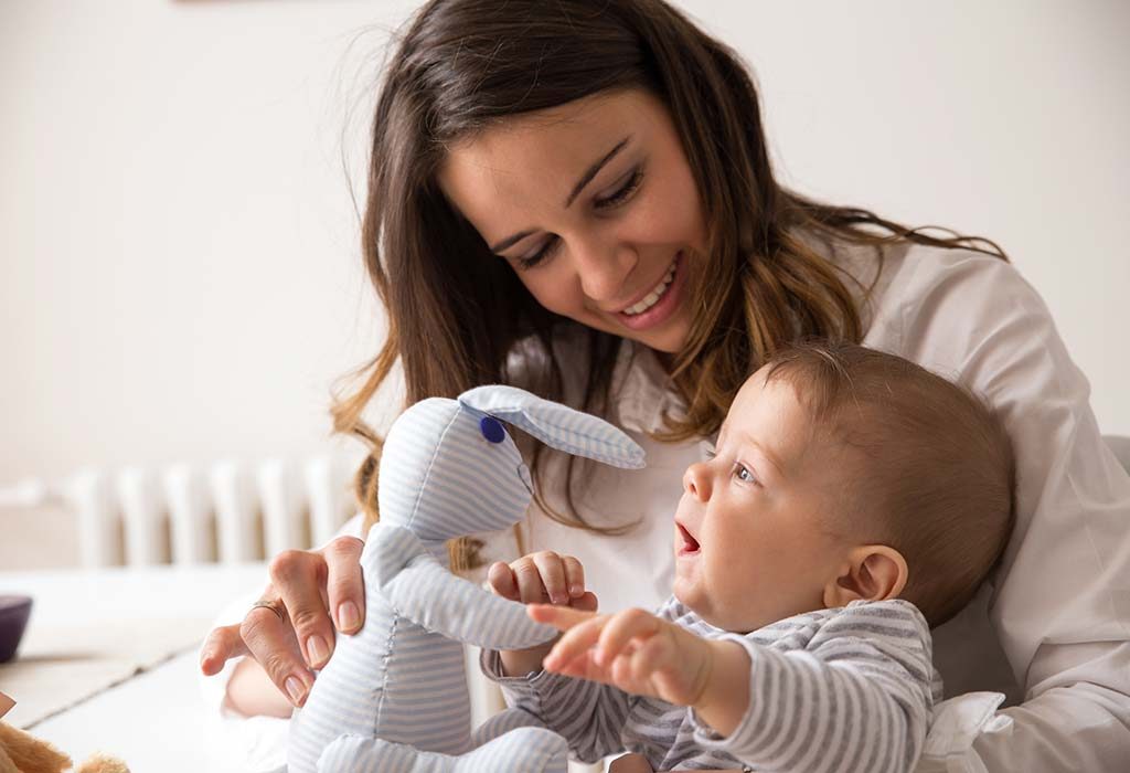 try to distract your baby with toys so he stops crying