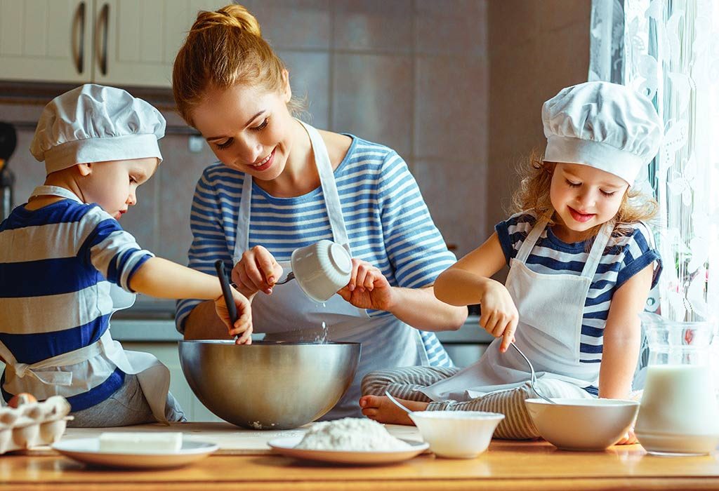Children baking cookies over the holidays