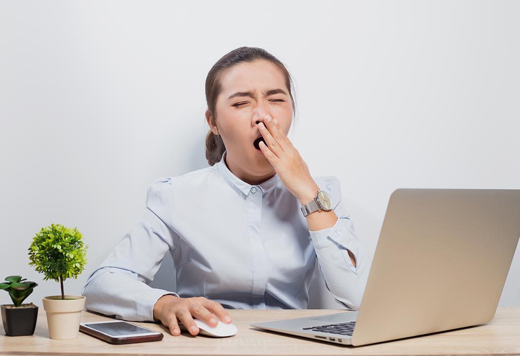 A woman sleepy in office