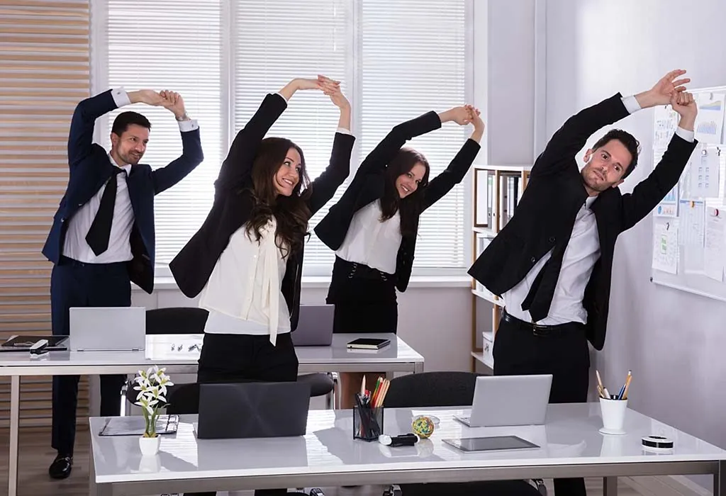 Office people stretching together