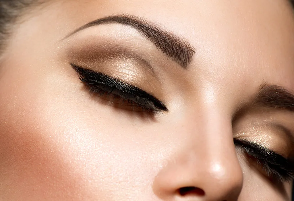 shimmery makeup with low-key lips is a great look