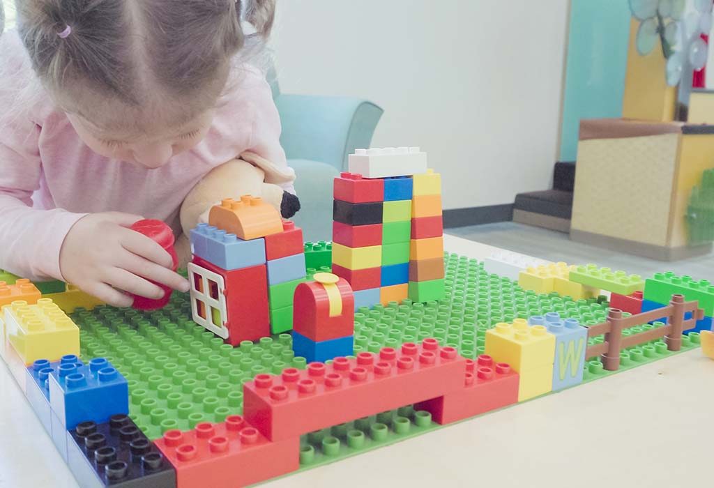 Girl PLaying with Building Blocks