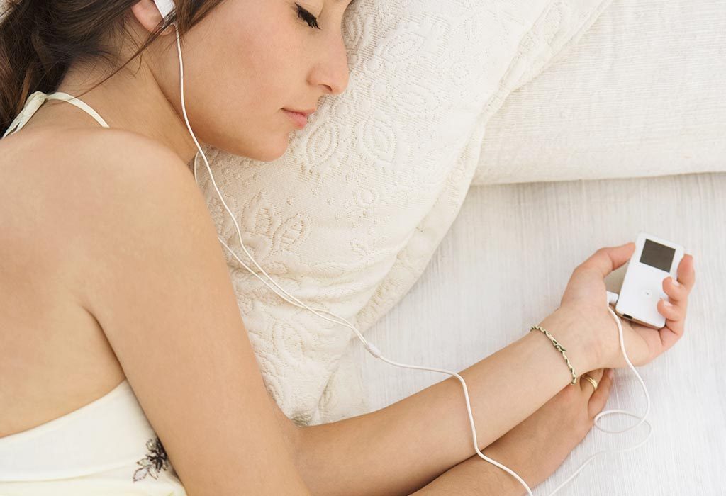 putting earphones while sleeping