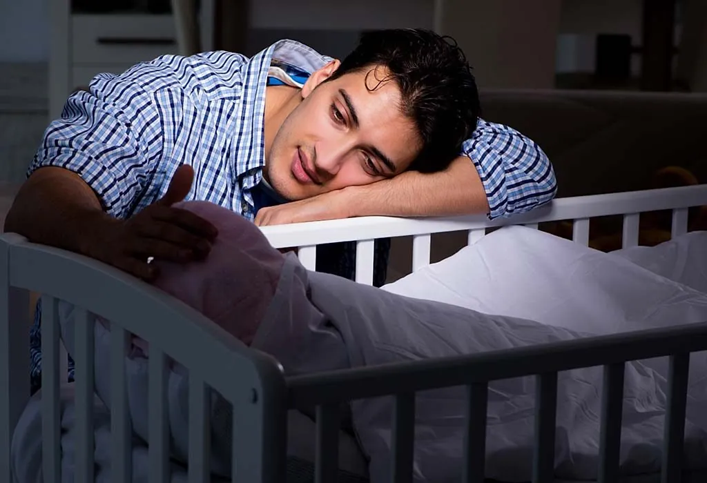 Dads sing lullabies to baby