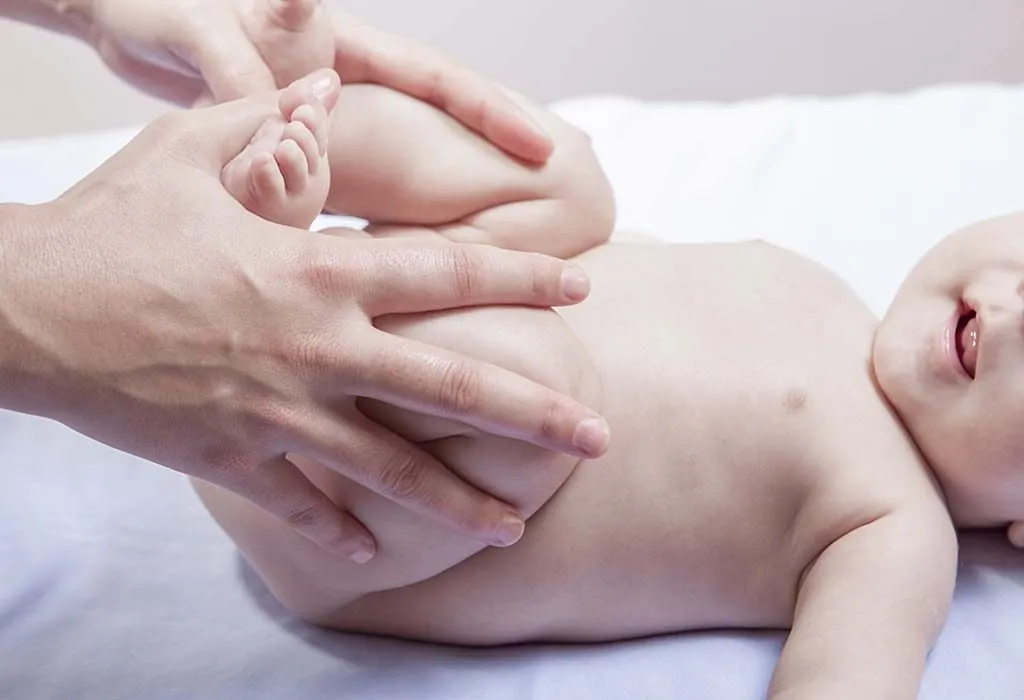 A baby receiving massage