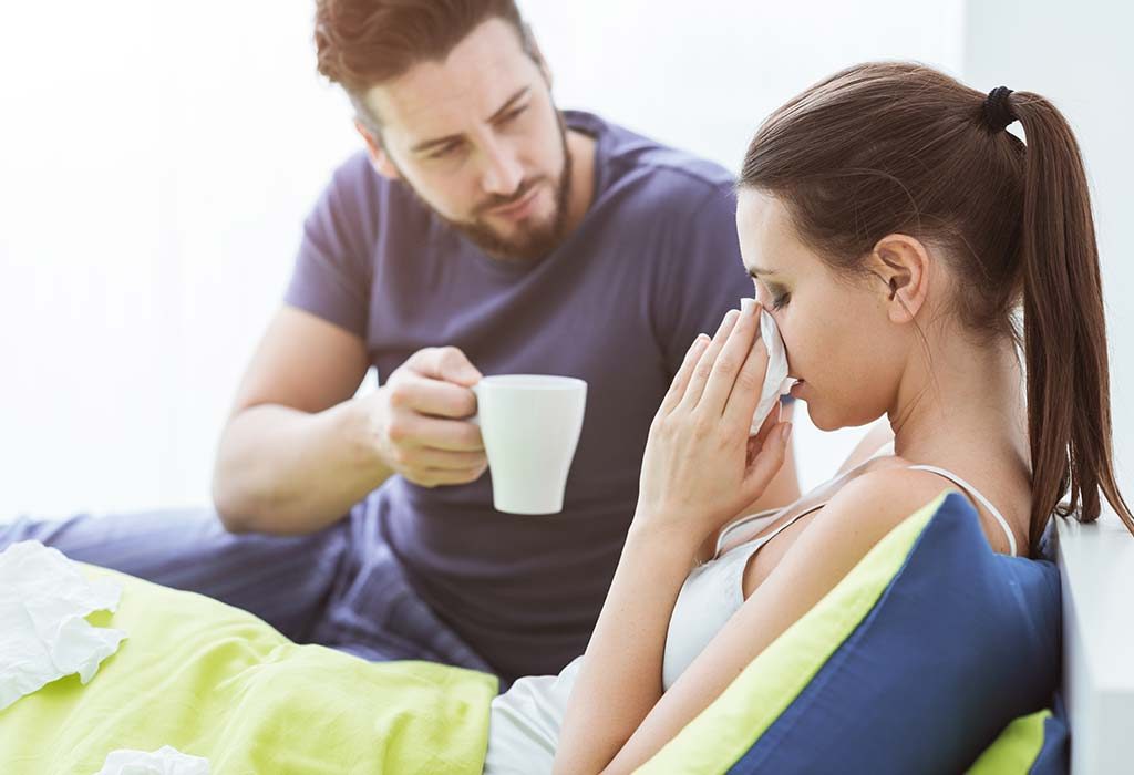 A husband takes care of his sick wife