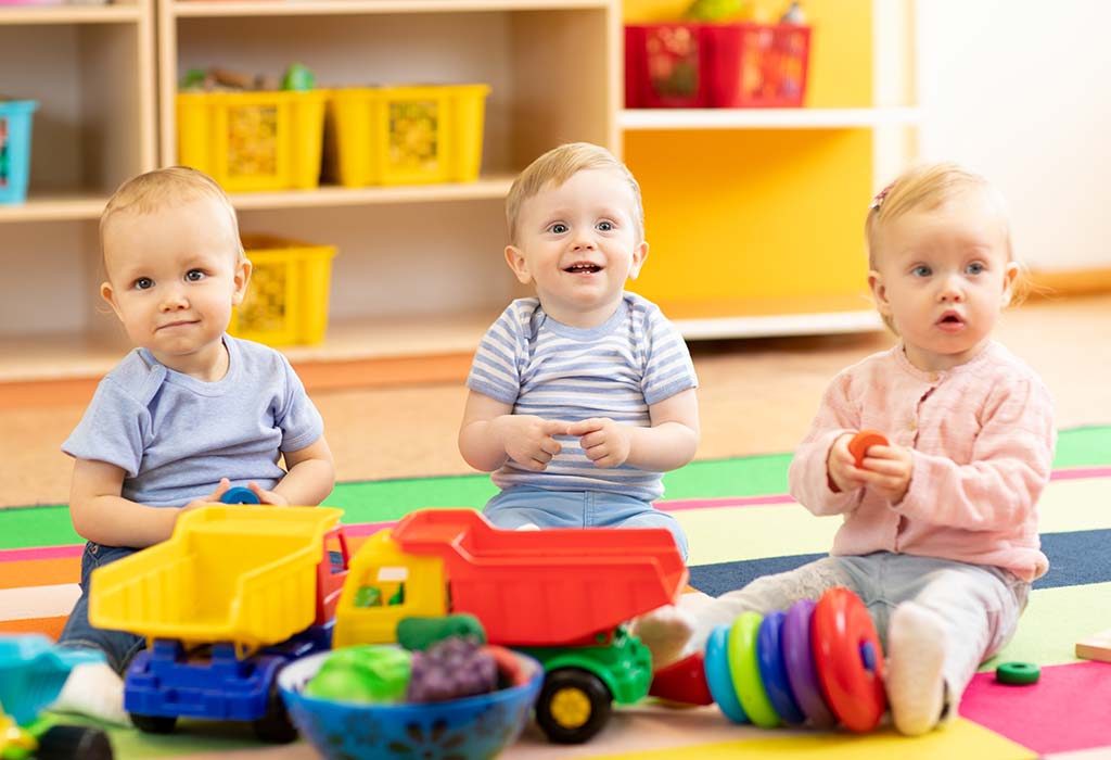 Babies playing with toys