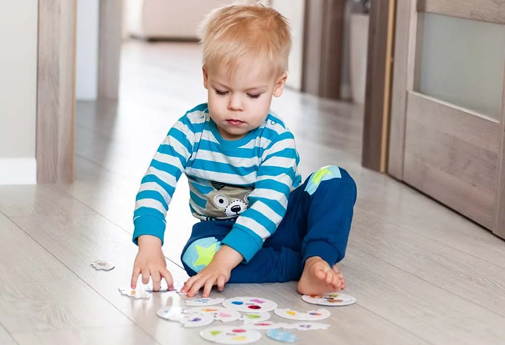 A child solving a puzzle