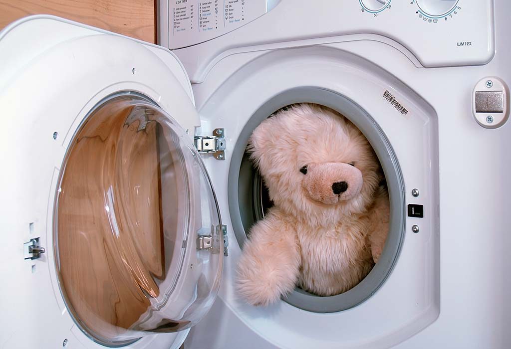 washing teddy bear in washing machine