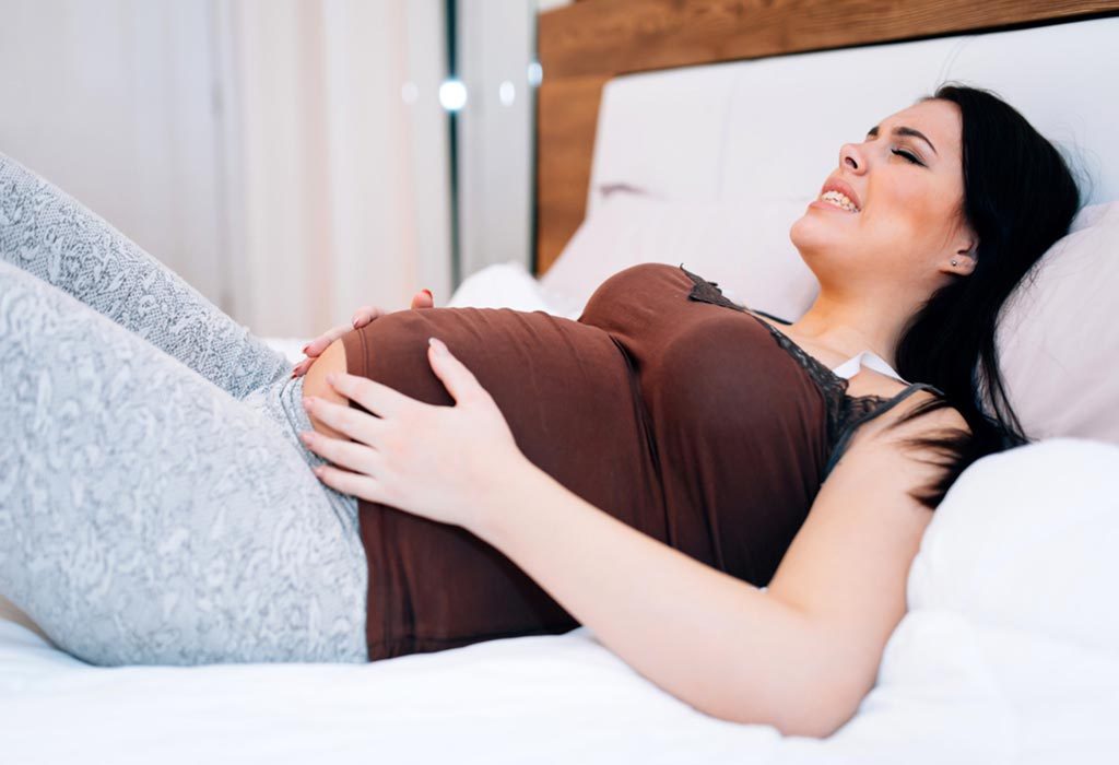 Ovary Pain During Pregnancy: Reasons & When to See Doctor