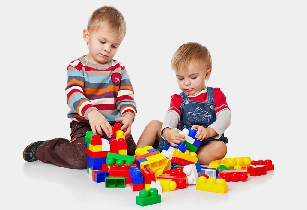 Two children playing close to each other