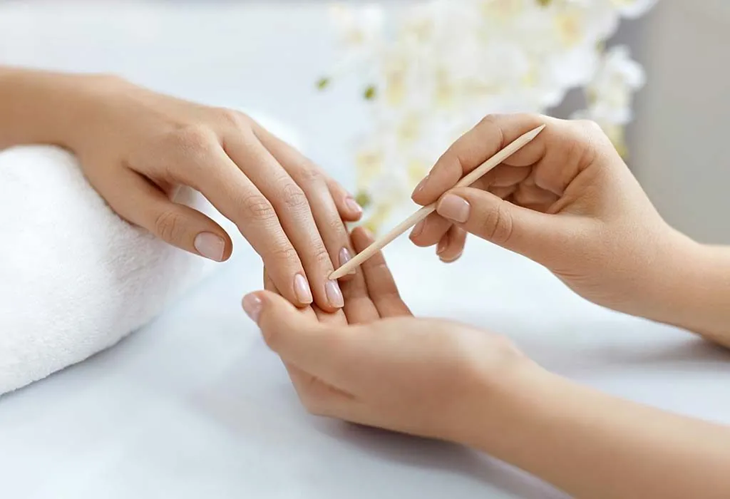 A woman getting a manicure
