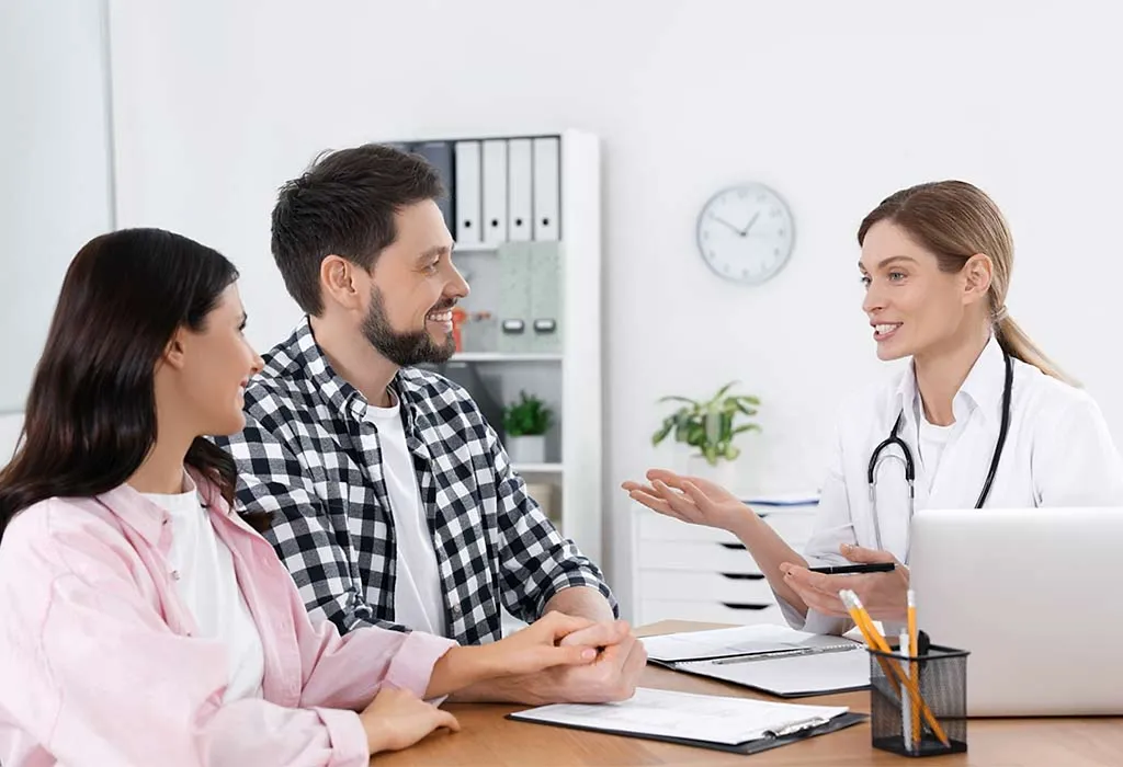 Couple having conversation with the doctor