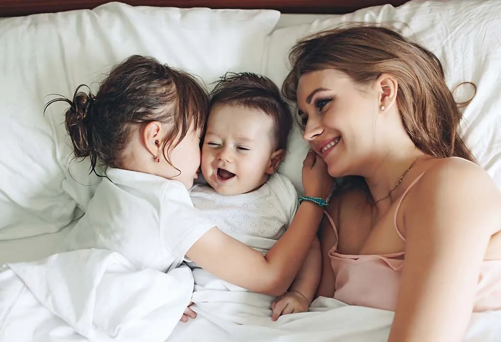 A mother spending time with her children
