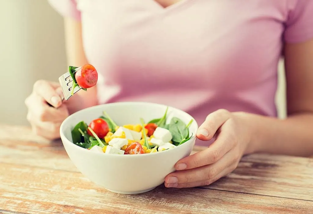 A woman eating healthy food