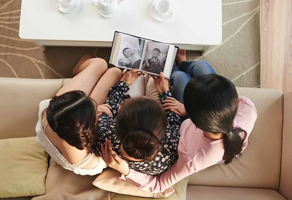 A family going through a photo album
