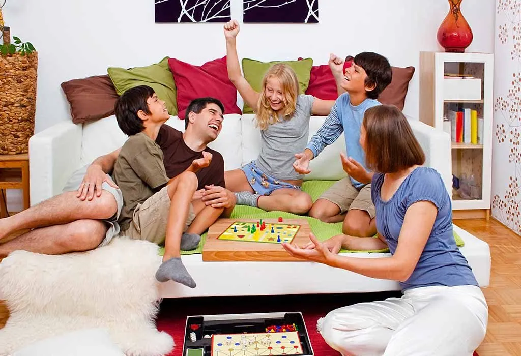 A happy family enjoying a board game