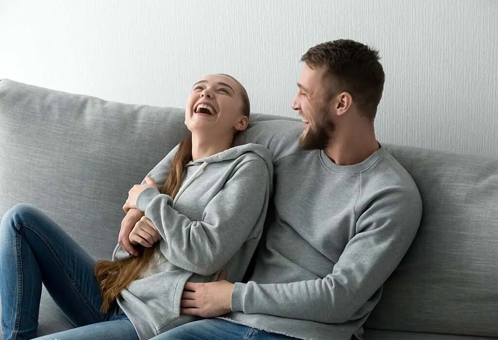 Husband laughing with wife Husband laughing with wife