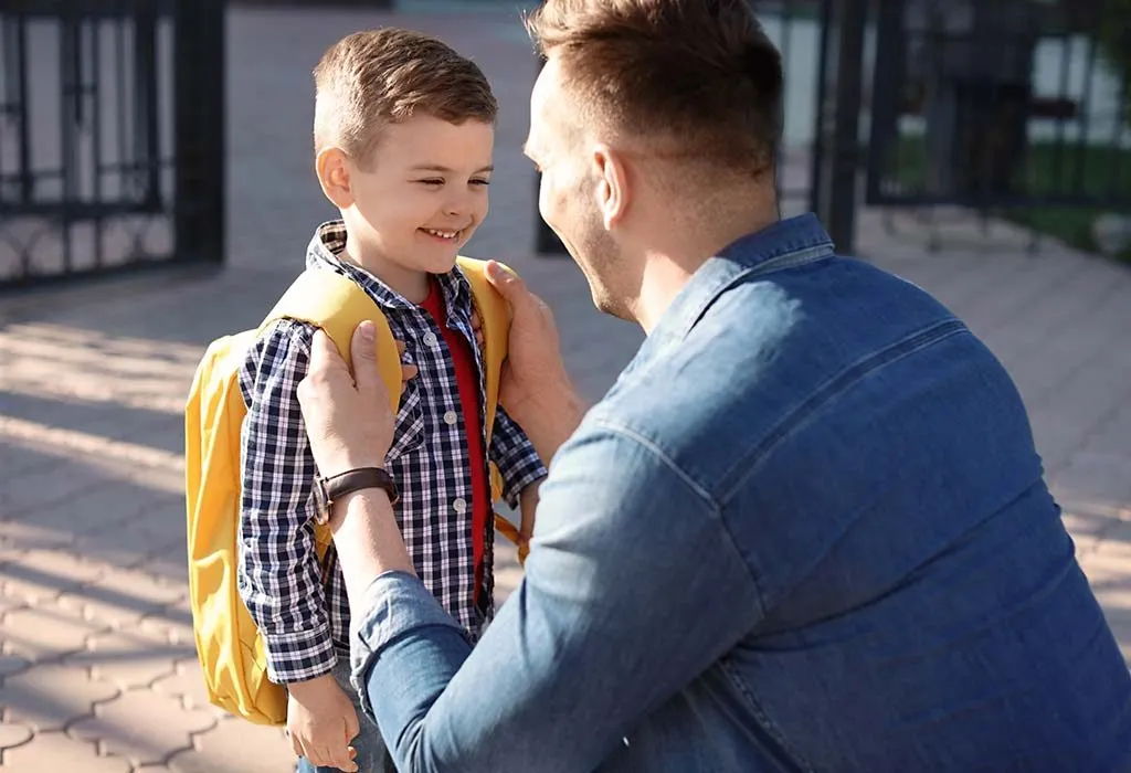 A father dropping off his son to school
