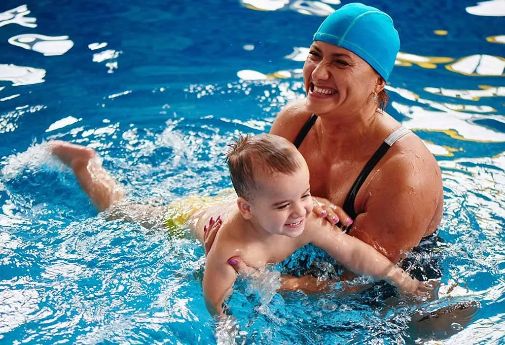 Mother & child swimming together