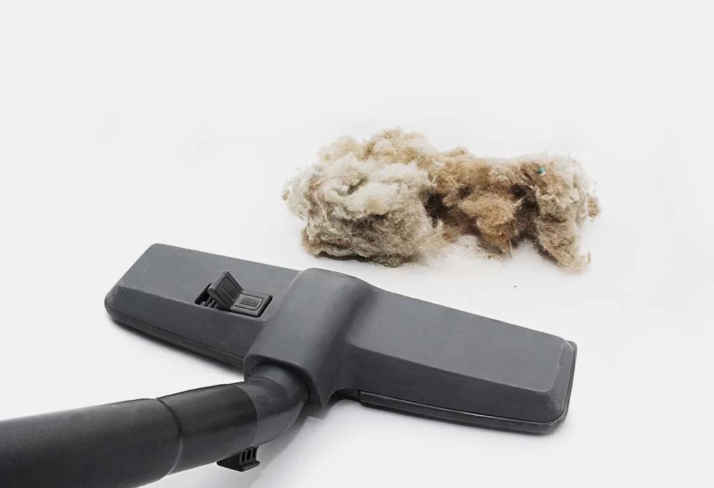 using vacuum cleaner to clean fan