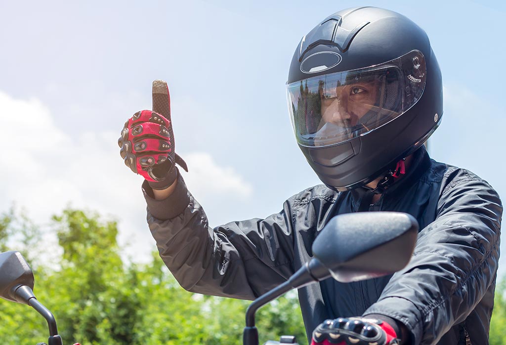 Bike rider with clearance helmet