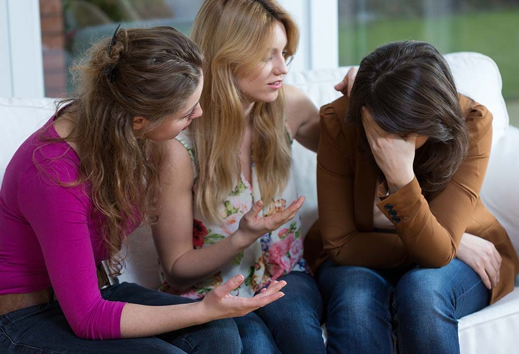 depressed woman with friends