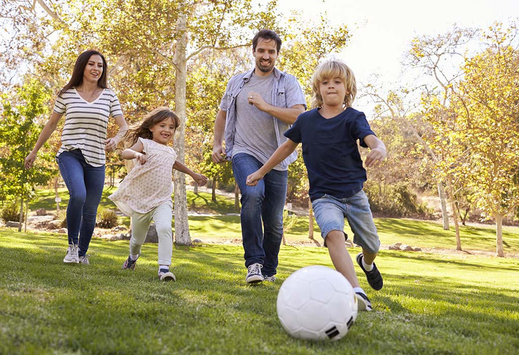 family playing football