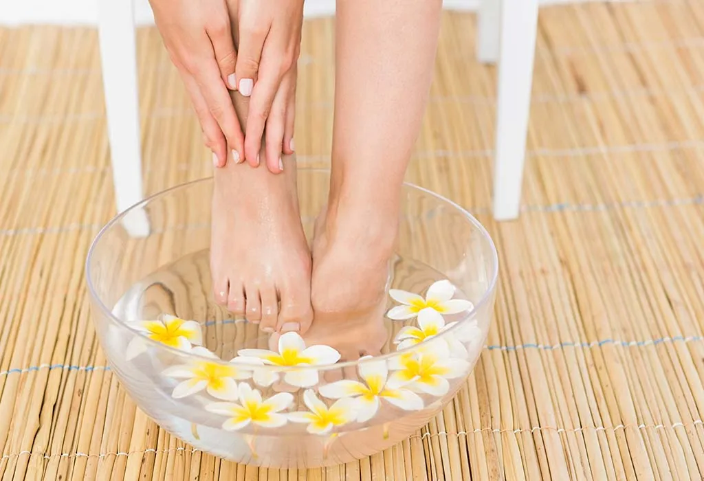 A woman washing her feet
