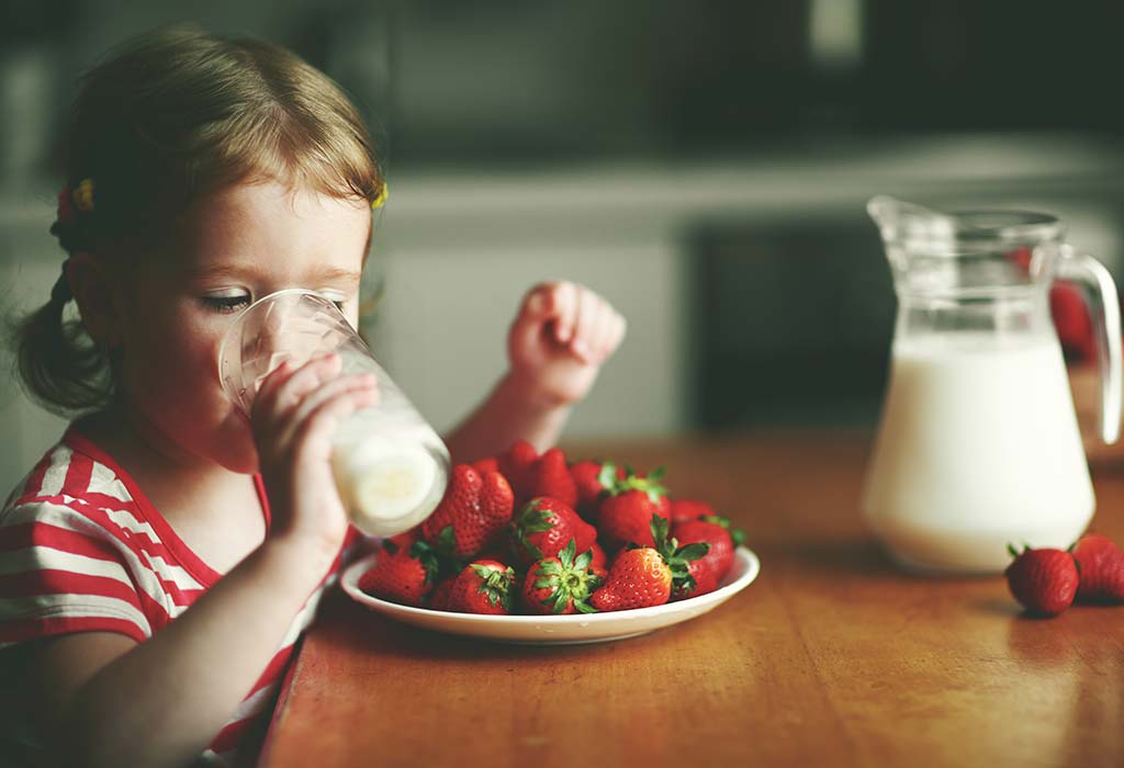 child drinking milk