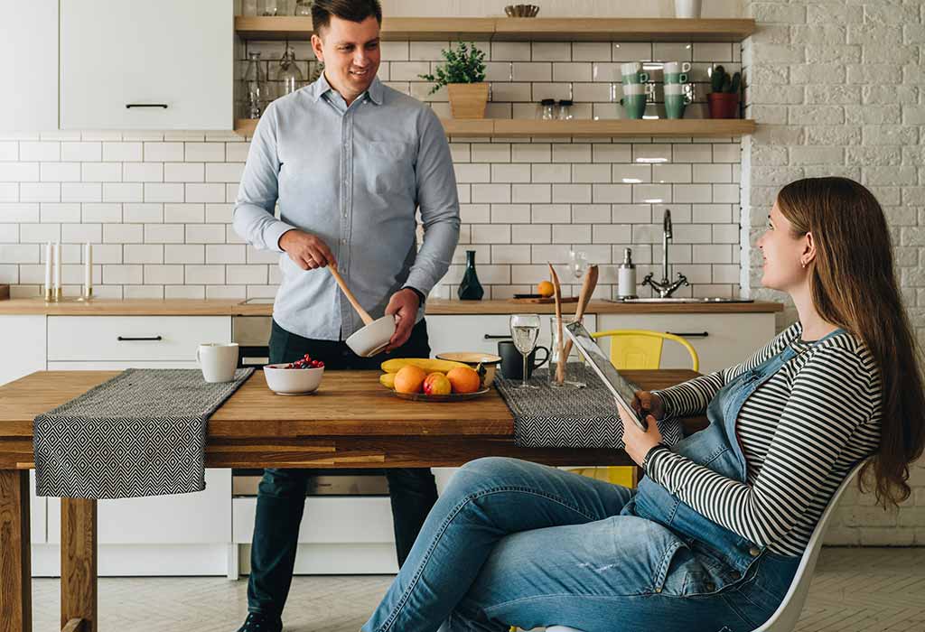 husband cooking for wife
