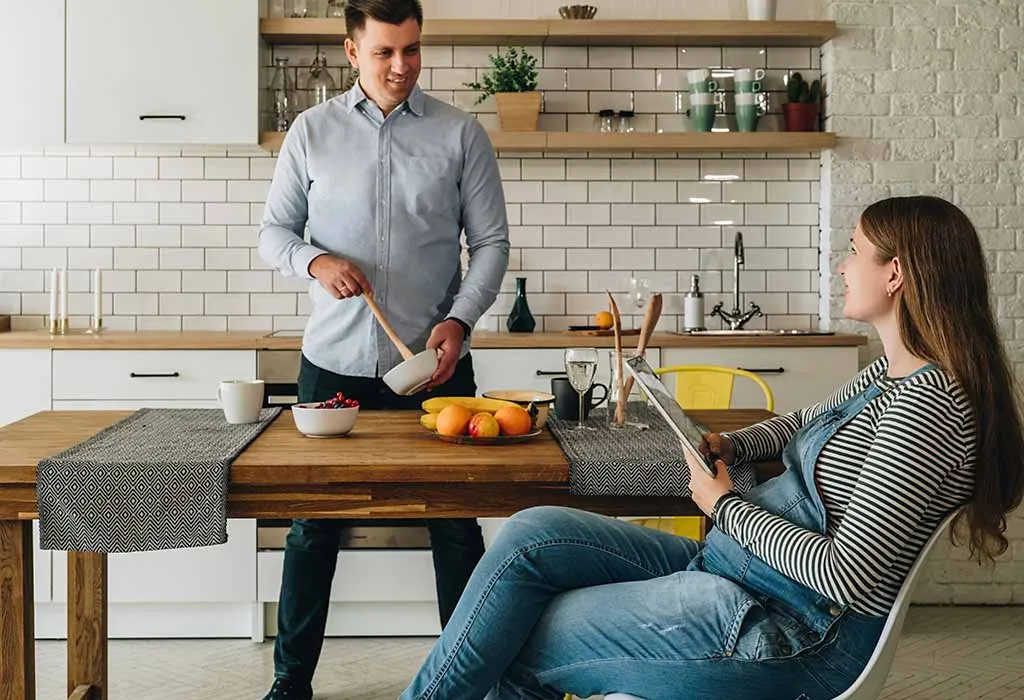 husband cooking for wife