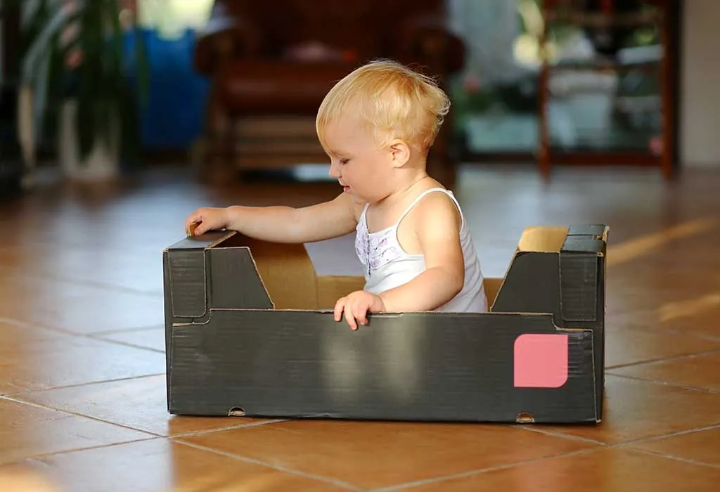 baby playing by herself