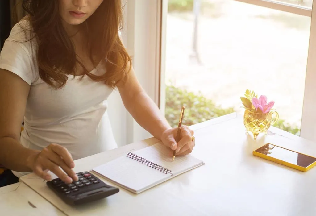 A pregnant woman planning her finances