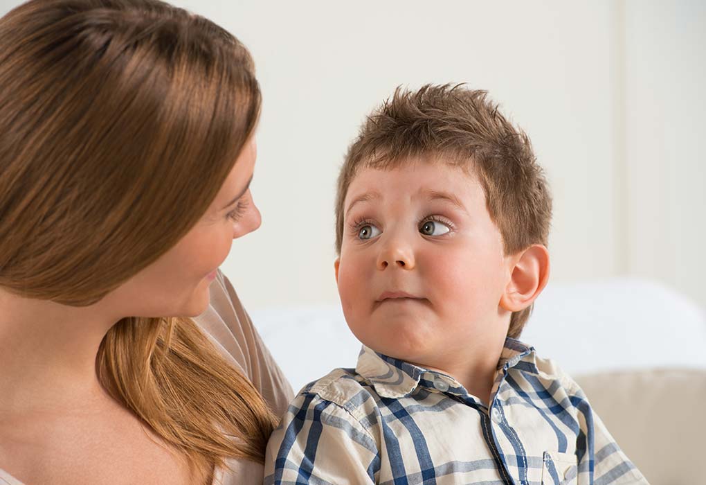 A boy talking to his mother about Coronavirus
