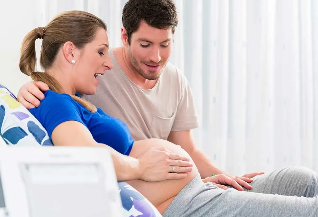 A pregnant couple in delivery room