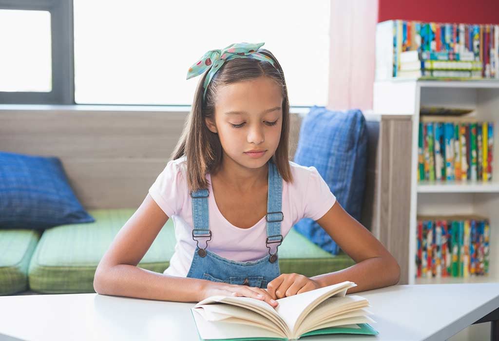 Schoolgirl read book.