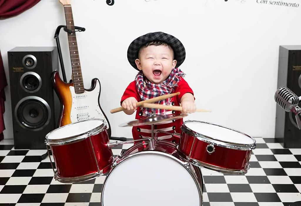 Toddler playing drums