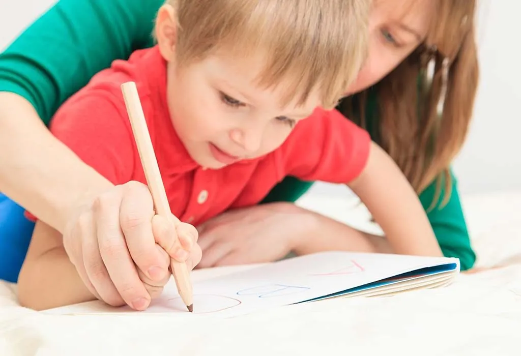 toddler writing letter